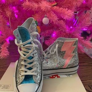 Glitter Converse High Tops. Pink lightning bolt accents on the sides!